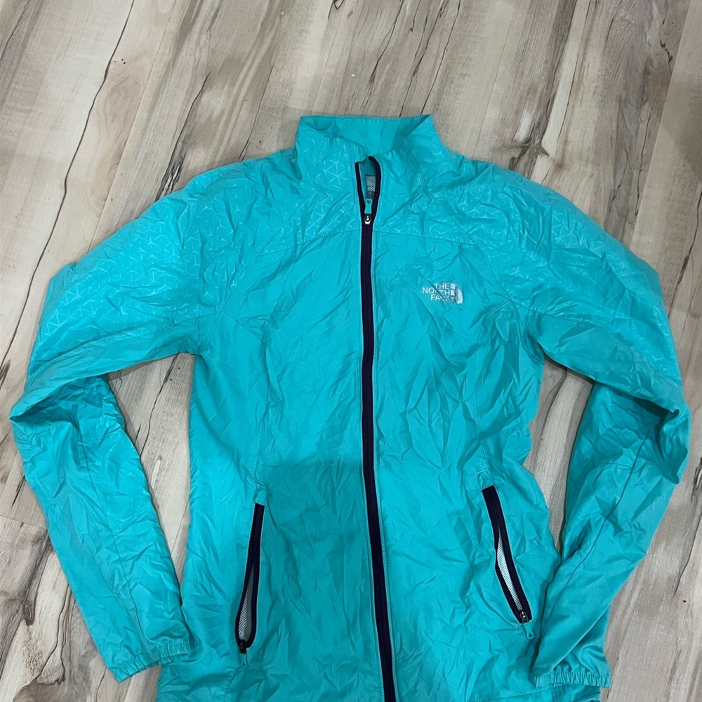 The North Face Women's Stow n Go running jacket.